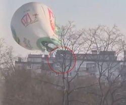 Horror as hot air balloon crashes into building - woman falls to her death