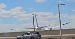 United Airlines plane hits street lamp in front of shocked onlookers - 'Oh my goodness!'