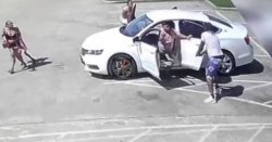 Dad pulls out gun and 'fires on suspected carjacker to save family'