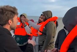 French film director caught coaching migrants to 'call 999' from sea - 'UK will rescue'