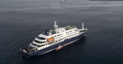 Virus infected ship docks at Tenerife as officials insist outbreak is 'not another Covid'