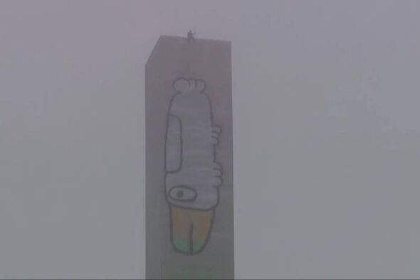 Man in six-hour standoff with police 460ft in air on iconic bridge demands jam sandwich