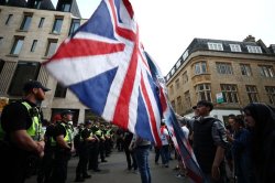Pubs 'close early' and protesters gather as Tommy Robinson joins debate over Islam