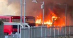Horror moment London double decker bus is engulfed by flames as firefighters swarm area