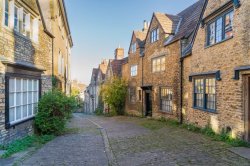 I visited a quiet UK town with cobbled streets and independent shops—I’d live there